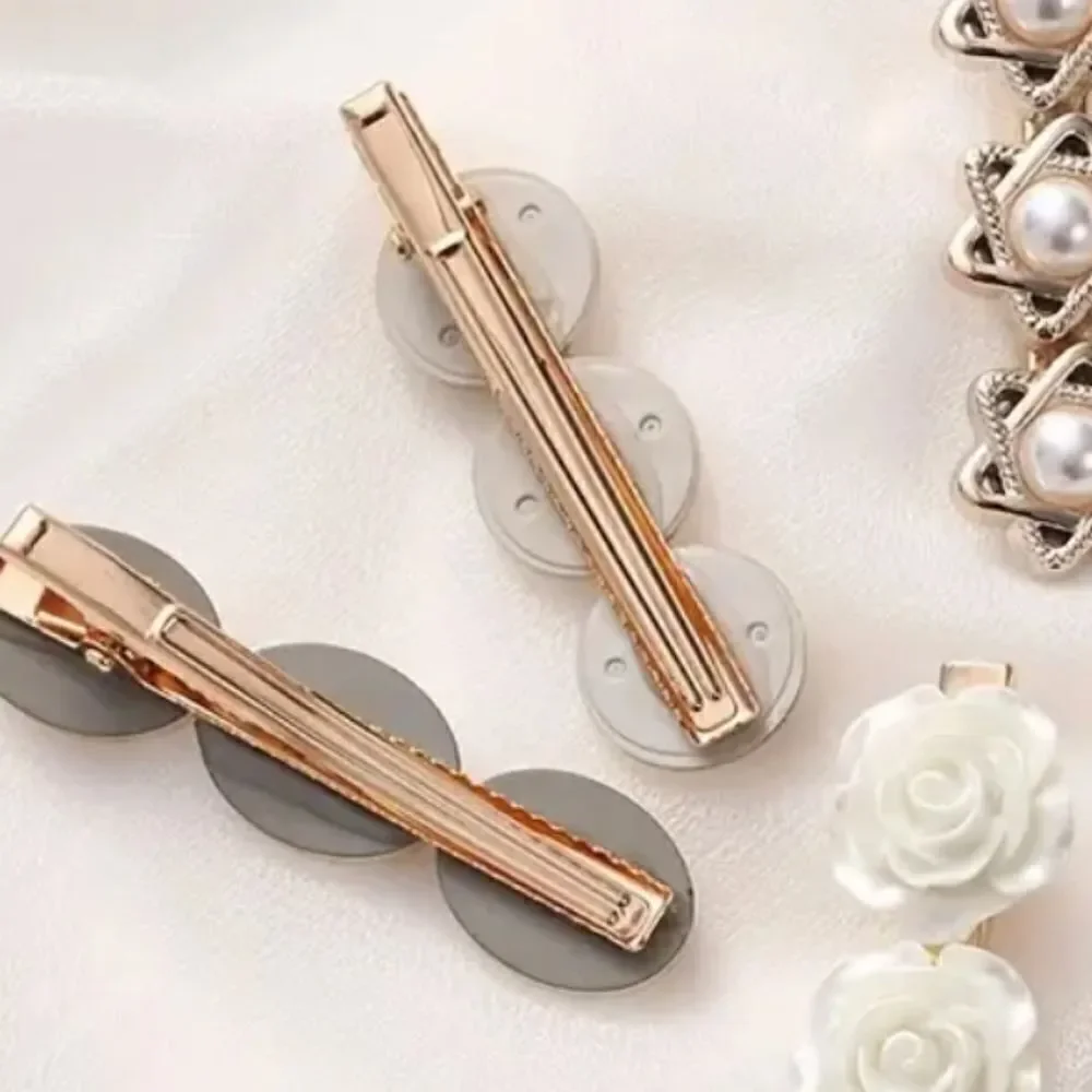 6 piece goldtone pearl shell clip set